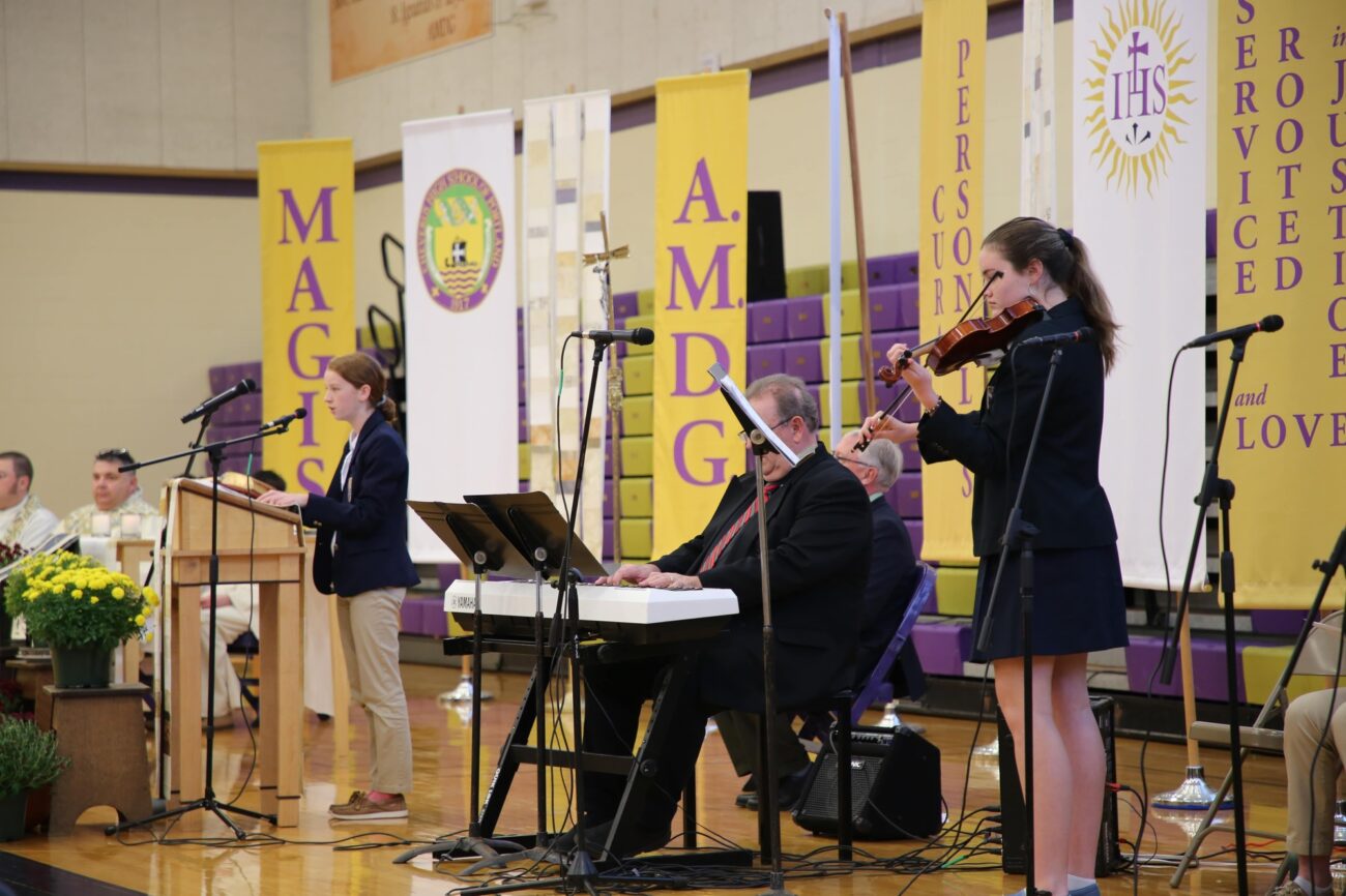 student performing at Mass